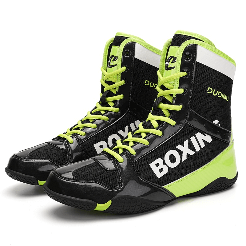 Black and neon green flexible anti-slip unisex wrestling sneakers with lace-up closure, designed for superior grip and traction.